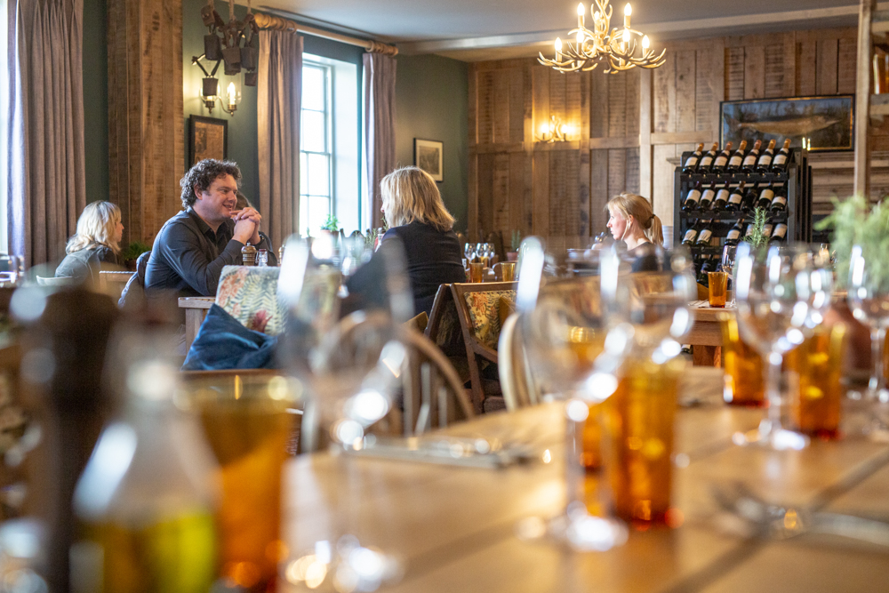 people dining at the black horse amberley